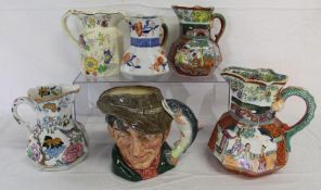 Mason's Ironstone jugs and a Royal Doulton Toby jug