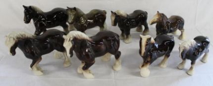 8 large ceramic working horses