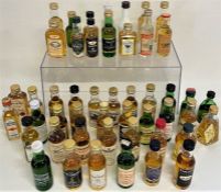 Selection of approximately 48 miniatures, including Bushmills, Laphroaig, Oban, Glenmorangie, etc