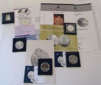 Silver coins: Silver Jubilee, One Dollar, Britannia, Queen Elizabeth I