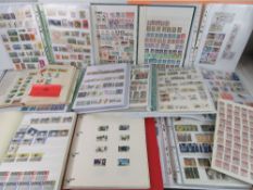 A large collection of mostly 20th century stamps within various books / albums.