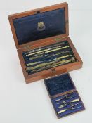 A fine Negretti and Zambra draftmans set containing various compasses and associated equipment,