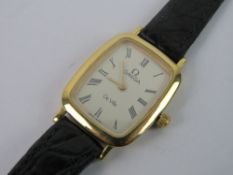 An Omega De Ville Quartz ladies wristwatch on original Omega black leather strap.