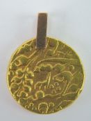 An Indian 22ct gold Mohur of the Late Mughal Presidency (AH 1130 or AD 1752?), 19mm dia, 11.