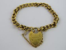 A 9ct gold curb link child's charm bracelet having heart padlock clasp, hallmarked 375, 5g.