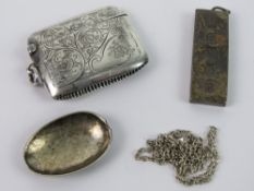A HM silver vesta case having foliate engraved pattern to both sides,