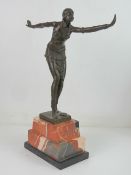 A contemporary bronze in the Art Deco style of a dancer raised over stepped marble base,
