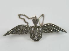 A silver and marcasite RAF 'wings' brooch.