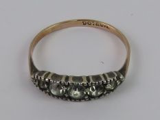 A vintage 9ct gold five stone ring, white stones set in silver on 9ct gold band, size L, 1.4g.
