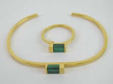 A suite of malachite jewellery comprising bangle and ring of geometric design, ring size adjustable.