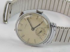 A WWII Cyma wristwatch having silvered dial with subsidiary seconds dial, engraved 'From M to W 16.