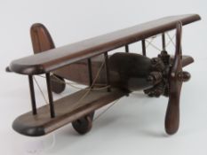 A wooden model of an Aeroplane having rotating propeller, 50cm wingspan.