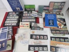 An album of 20th century stamps together with a quantity of assorted presentation packs,