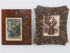 Two unusual vintage photograph frames, one with offset aperture and handpainted chrysanthemum,