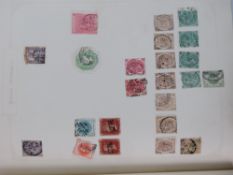 Stamps - A cased album containing Victorian lilac, Penny Reds , green octagonal , Poached Egg , Kg5,