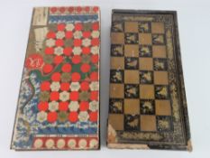 A 19th century Chinese export lacquer rectangular games box, decorated in gilt with a chess board,