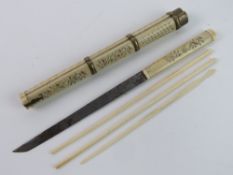 A late 18th early 19th century Chinese Gentlemans Trousse in ivory comprising knife,