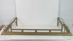 Arts and Crafts,Asthetic Movement - a 19thC Brass Fire Curb, having tool rests to sides ,