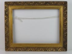 Rare Art Deco Gilt frame - an ornamental moulded motif and integeral gilt slip frame 2 3/4 inches