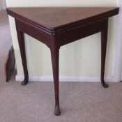 A good 19thC mahogany metamorphic 'cricket' games and tea table.