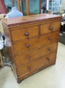 A Victorian two over three mahogany chest of drawers having matching turned handles, 100cm wide,