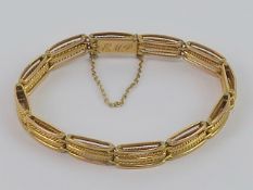 A 9ct gold articulated bracelet,