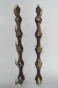 A pair of oak and muntjack antler hanging racks, each measuring 75cm in length.
