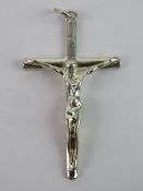 A large crucifix, 6.5cm in length inc bale, stamped 925.