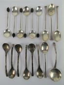 A set of four HM silver teaspoons, 35g, together with a set of six coffee 'bean' spoons, 30.