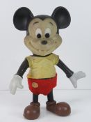 A vintage plasticised Mickey Mouse figurine c1950-60s, made by Walt Disney Productions,