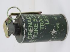 An inert British L83A1 smoke screen hand grenade.