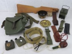 A quantity of assorted militaria inc, bayonet frogs, Asian rice bowl,