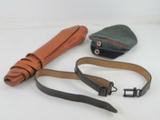 A G98 breech cover, together with a G98 sling and a WWI German Feldmutz cap.