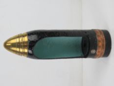 A British cutaway 18 pounder shell.
