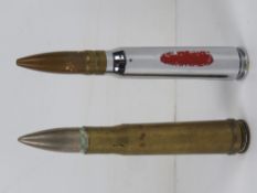 An inert Boys anti tank rifle round dated 1943 appro 13.8cm in length.