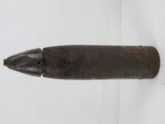A German WWII LeFH 10.5 inert round with fuse, dated 1944.