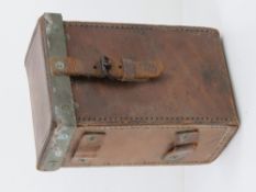 A WWII British .303 Vickers gun leather case dated 1943.