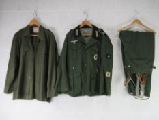 Repro uniform; A German Combat Jacket with insignia, size 46, German Combat shirt size 46.