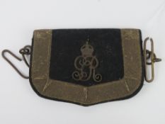 A Cavalry cross belt cartridge pouch having GR insignia upon and faded gilt embroidery border.