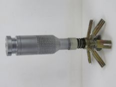 An inert Russian PTab cluster bomb with end cap measuring 30.5cm in length.