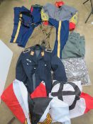 A quantity of assorted repro Military jackets, trousers and belts.