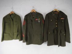 Repro uniform; jackets, one with insignia and one pair of trousers.