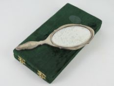 Eva Braun: An 800 grade silver hand mirror having original beveled edge oval glass bearing the 'EB'