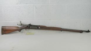 A deactivated Krag Jorgenson Rifle. SN 35282 (St. No. 39019).