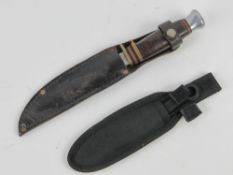 A Bowie/Sheath knife by William Rodgers, together with a throwing knife.