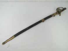 A Naval sword and scabbard.