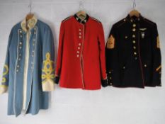 A quantity of assorted repro militaria including jackets, shoes, helmets.
