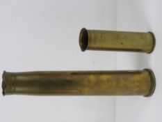 A WWII British trench art shell case together with a WWI 2pr trench art shell case.