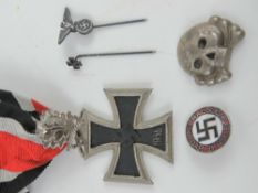 Five assorted German medals, pins and badges.