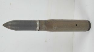 A WWII German inert 20mm flak round dated 1943.
